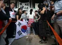 '성조기 여성' 지각 조사, 중국인들이 너무 많아